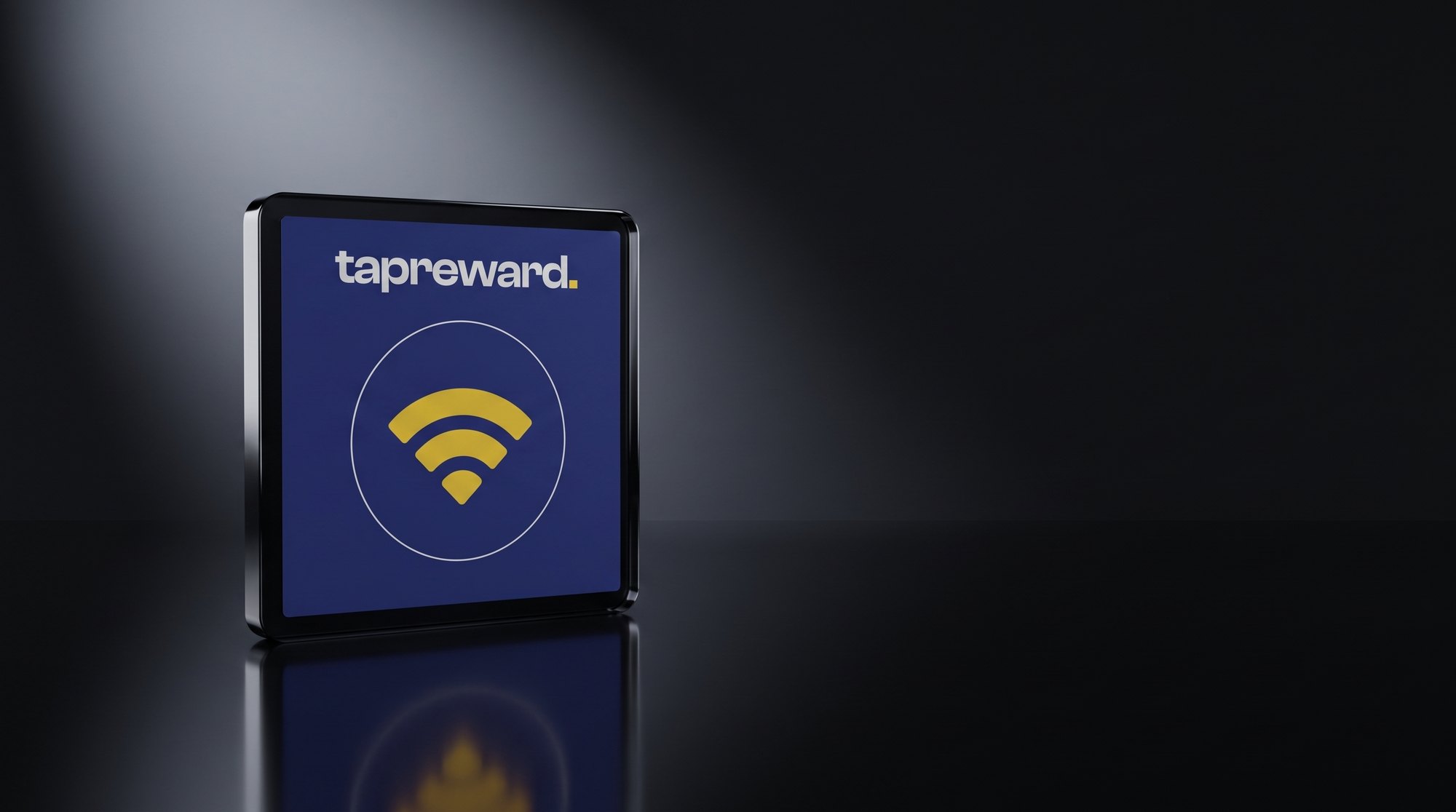 The TapReward tap tag photographed on a dark surface